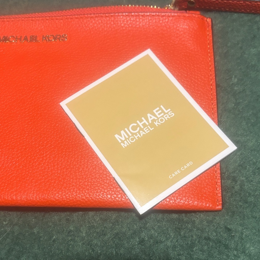 Michael Kors Vibrant Large Orange Wristlet